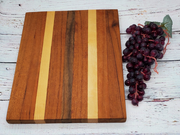 Handmade maple, walnut, cherry, and spanish cedar cheeseboard alternate view