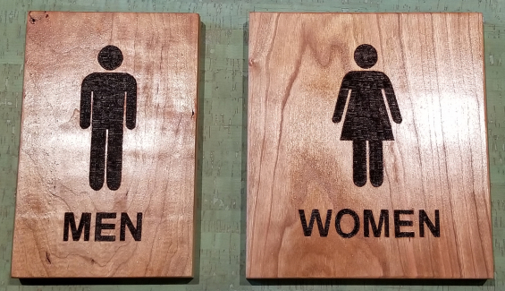 Custom restroom signs wood burned on Cherry